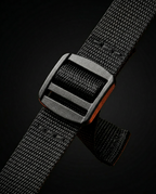 Macro of the ladder-lock strap adjuster on the woven hammock webbing