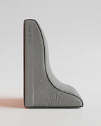 Side profile of structured wedge backrest showing ergonomic curve