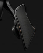 Macro of the textured black ergonomic thigh pad on the hip trainer