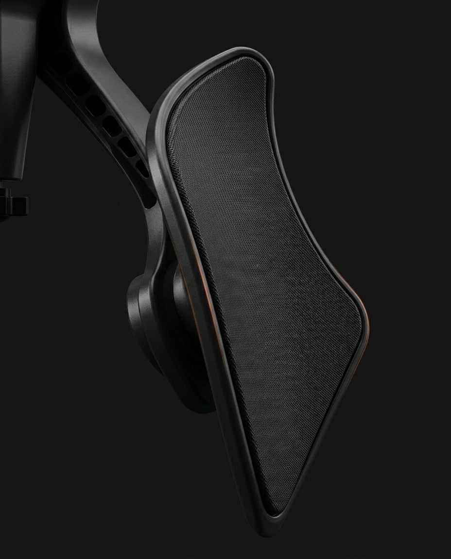 Macro of the textured black ergonomic thigh pad on the hip trainer
