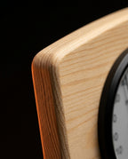 Macro of natural pine wood grain on rounded sauna gauge frame