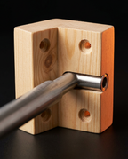 Detail of pine wood wall mount holding the steel aromatherapy bowl arm