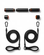 Exploded view of Pilates bar kit parts: sections, clips, bands, foot straps