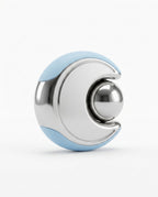 Sky blue variant of the cold facial reset device, studio shot on white