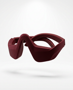 Red color variant of the heated eye massager on a white background