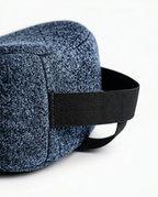 Macro of the adjustable elastic positioning strap on the knee pillow