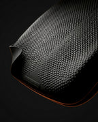 Close-up of the dotted non-slip rubber base on the memory foam seat cushion