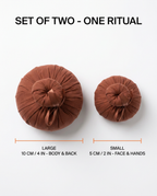 Size guide comparing the large and small herbal compress balls