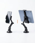 Two mounts side by side holding a phone and a tablet for device compatibility