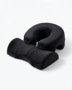 Black variant of the face-down comfort pillow set, studio shot on white
