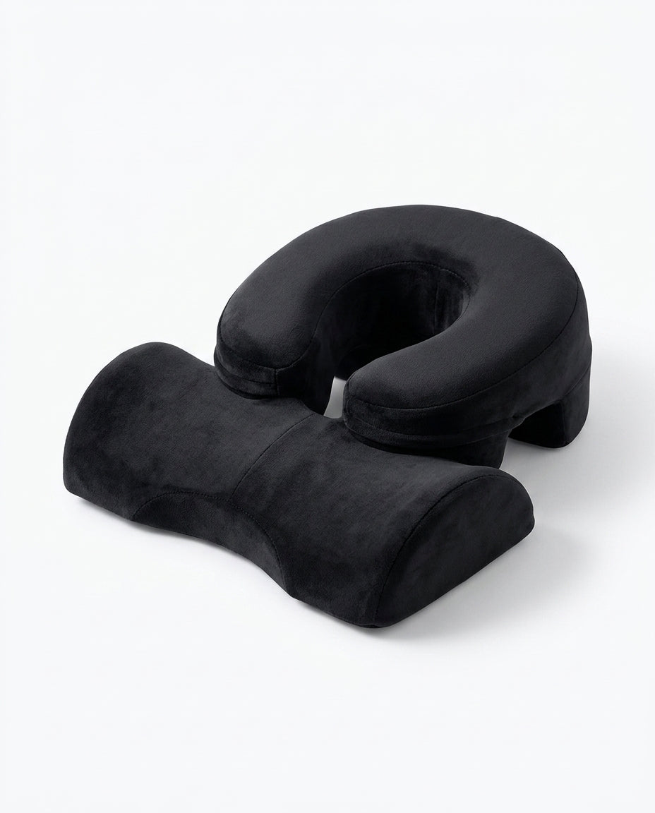 Black variant of the face-down comfort pillow set, studio shot on white