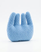 Blue four-finger hand relaxation cushion on a white background, side view