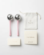 Flat lay of two cooling rollers, a drawstring pouch and Pyre Fit cards