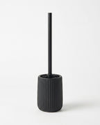 Black ribbed ceramic toilet brush holder set, front view on white
