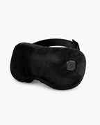 Black color variant of the plush heated eye massage mask on white
