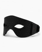 Black variant of the LED red light eye mask, studio shot on white