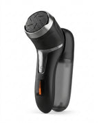 Black electric foot file with dust chamber attached, three-quarter studio view