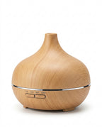 Light wood grain variant of the aromatherapy diffuser, studio shot on white
