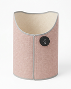 Pink fabric foldable leg warmer with digital control display on white background
