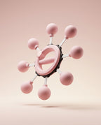 Pink arm rotation trainer floating against a soft blush backdrop