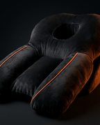 Close-up of the twin arm bolsters and contoured channels of the support pillow