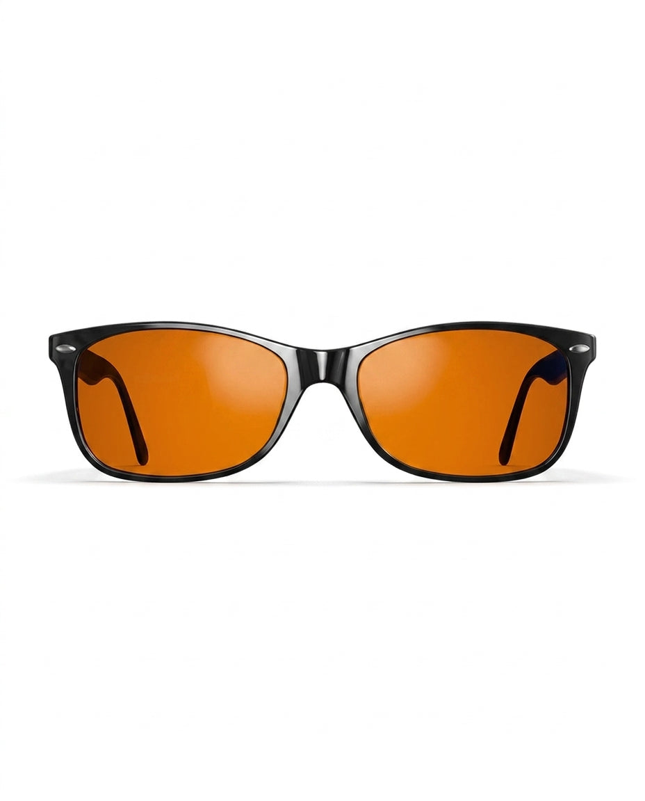 Black frame blue light glasses with deep amber lenses, front view on white