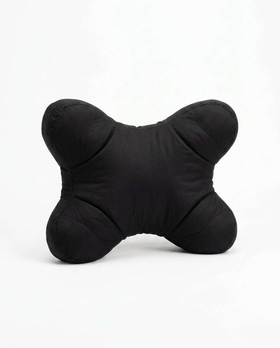 Black butterfly-shaped support pillow on a white background, front view