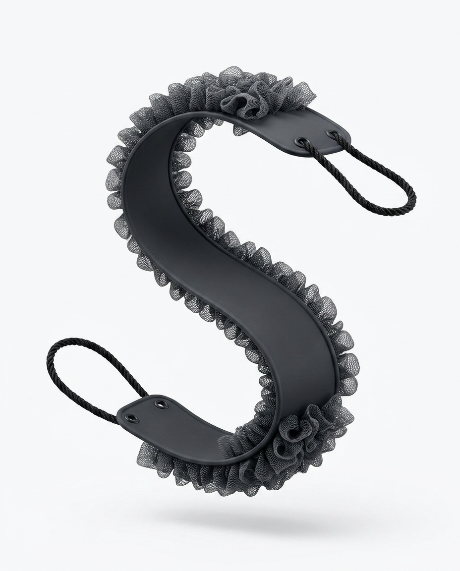 Black back scrubber curved into an S-shape showing silicone backbone and loops