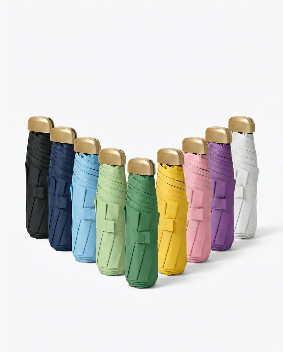 Lineup of folded UV umbrellas in nine colors with gold capsule caps