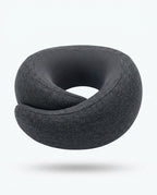 Dark grey travel neck pillow with mesh inner panel, studio shot on white