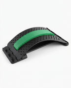 Black back stretcher with a green spine pad, packshot on white background