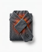 Folded heather grey heated scarf with warm orange heat glowing through