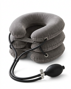 Grey inflatable neck traction collar variant with pump on white