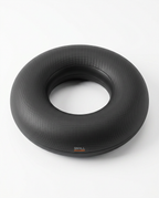 Black Small stability ring, donut-shaped, studio shot on white