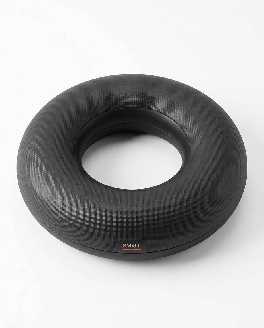 Black Small stability ring, donut-shaped, studio shot on white