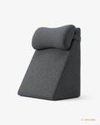 Space gray wedge backrest cushion with rounded headrest, side view