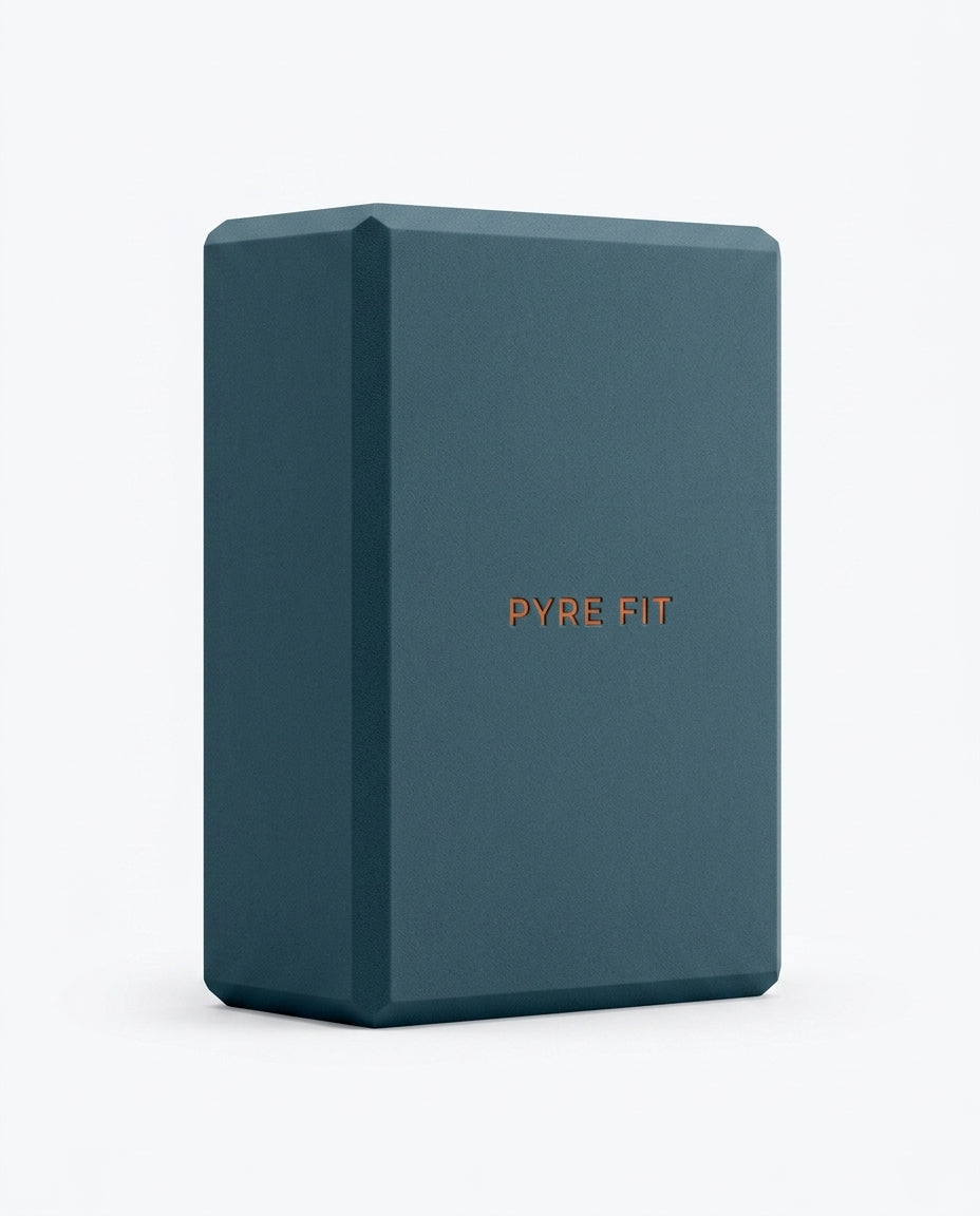 Teal blue EVA foam yoga block with embossed logo, studio shot on white