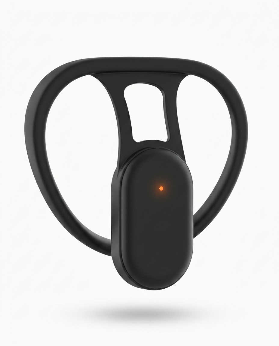 Black posture corrector with glowing orange light, front view on white