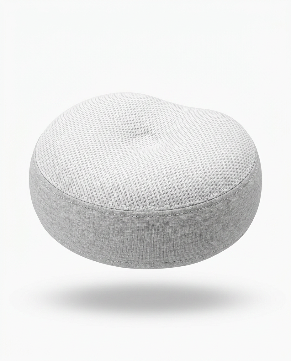 Light grey and white traction pillow variant showing the contoured neck indent