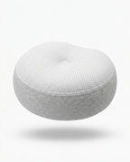 Light grey and white traction pillow variant showing the contoured neck indent