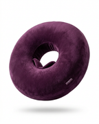 Purple velvet ring lap support pillow on white background, front view