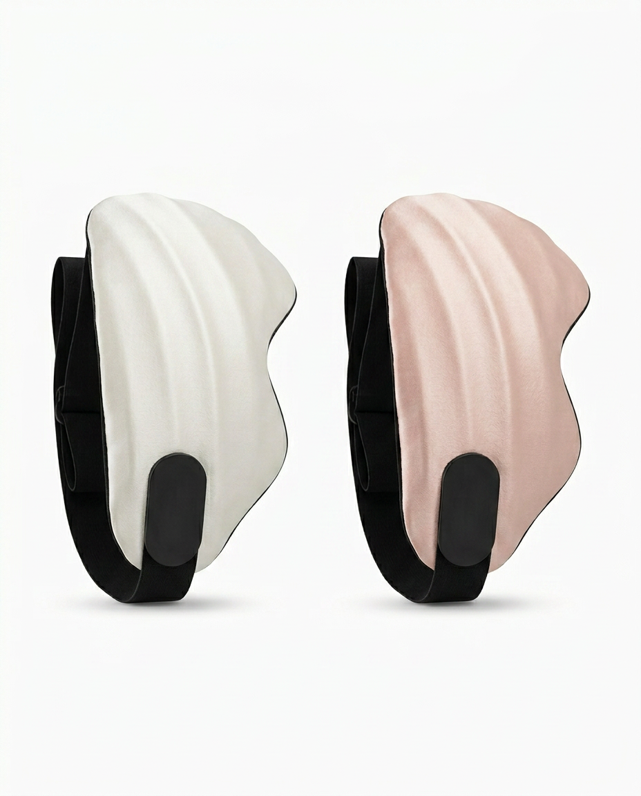 Ivory and pink contoured silk sleep masks shown side by side
