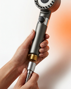Hands twisting the shower head onto a standard hose, tool-free install
