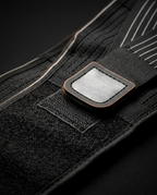 Macro of the hook-and-loop closure and front buckle of the support belt