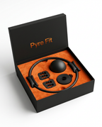 Pilates set arranged in a black gift box with orange foam insert