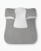 Top-down view of wedge pillow showing contoured shape and neck channel
