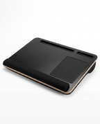 All-black lap desk with mouse pad and bolster cushion on white background