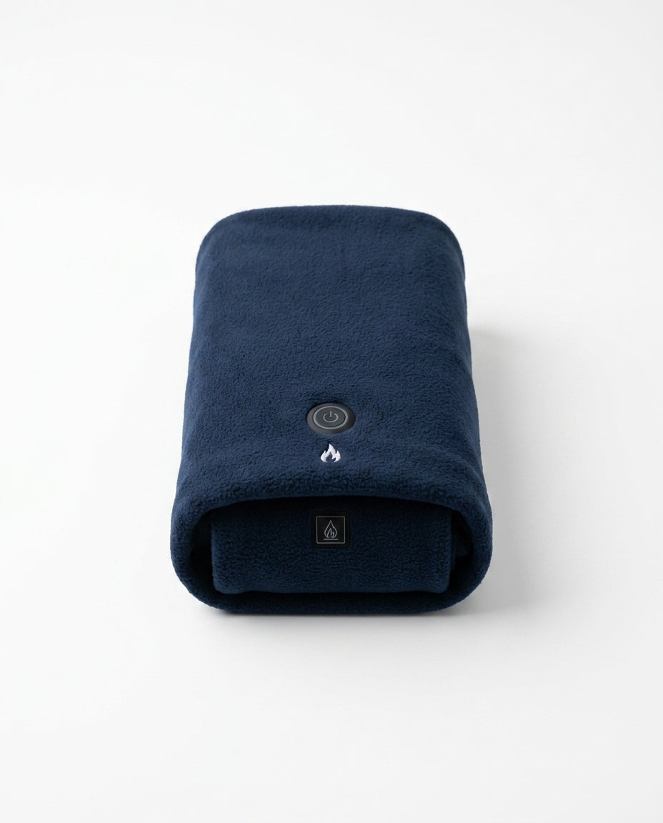 Rolled navy blue heated comfort scarf with power button, studio packshot