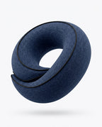Navy blue U-shaped memory foam travel neck pillow, studio shot on white