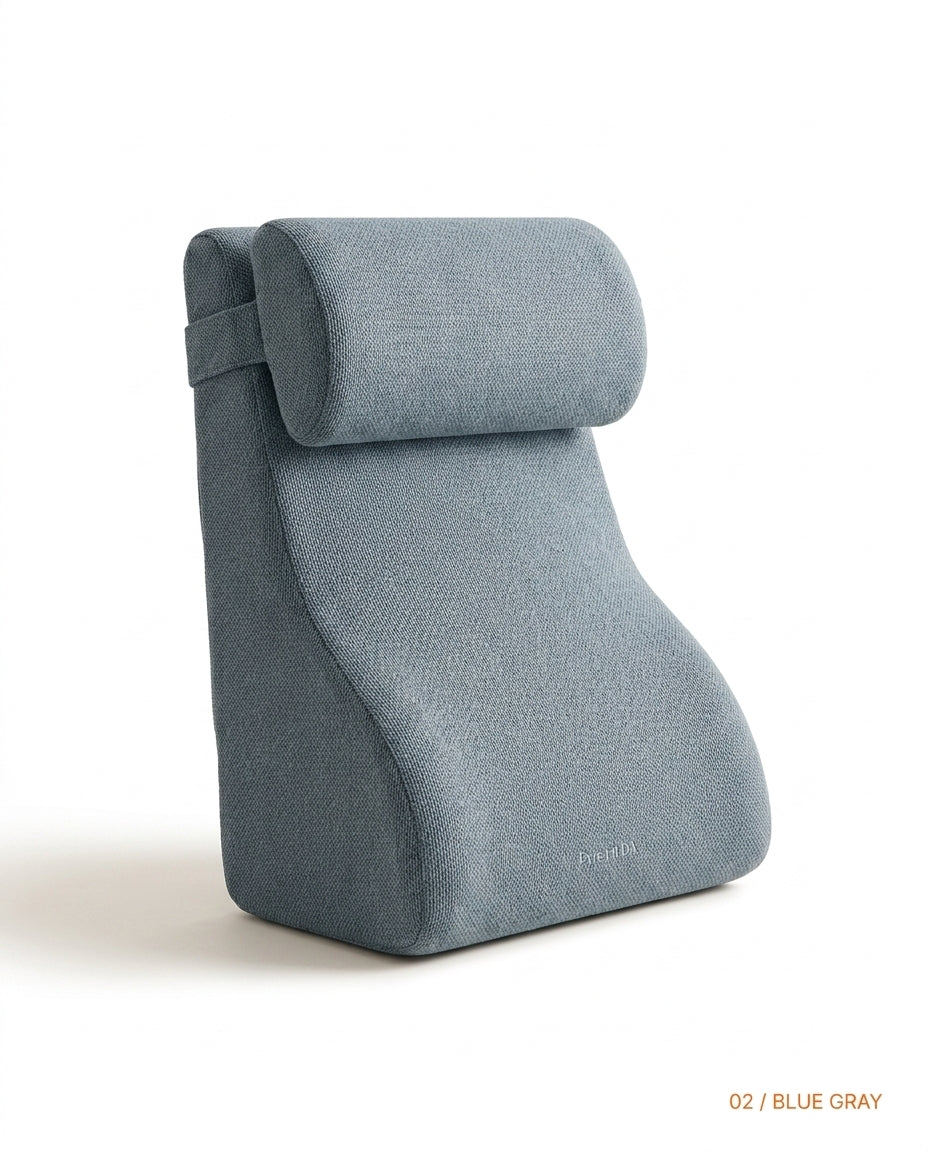 Blue gray wedge reading pillow with contoured lumbar curve, side view
